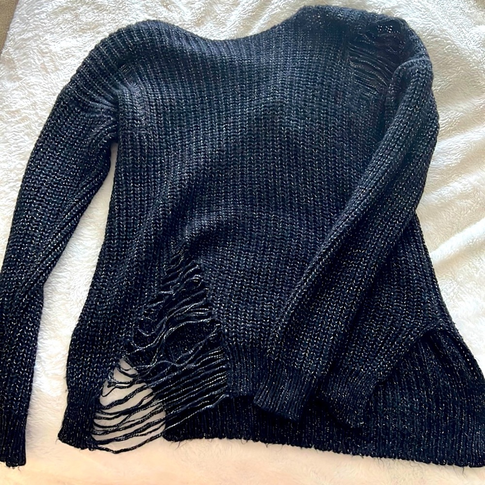 Distressed women’s sweater